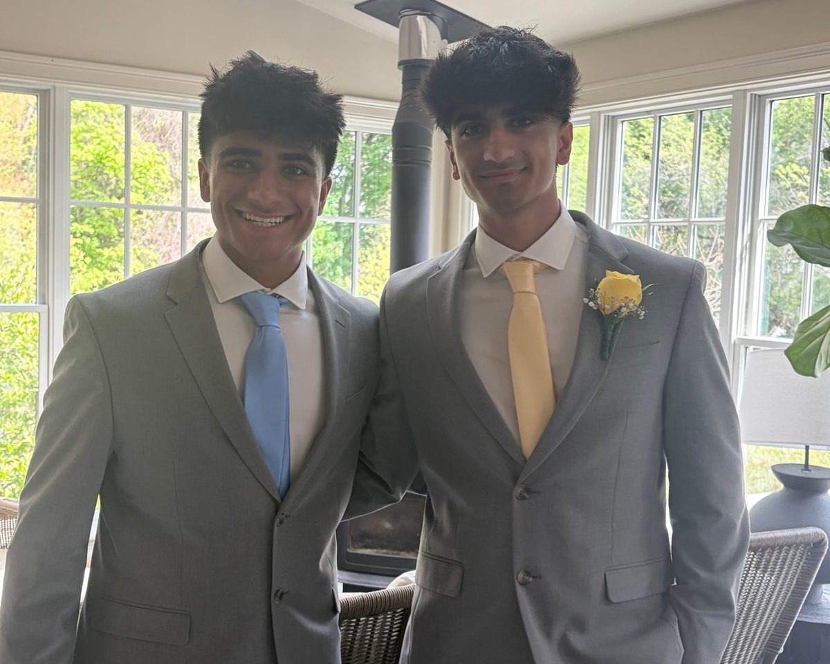 Avik and Ansh Sattiraju, the founders, in grey suits