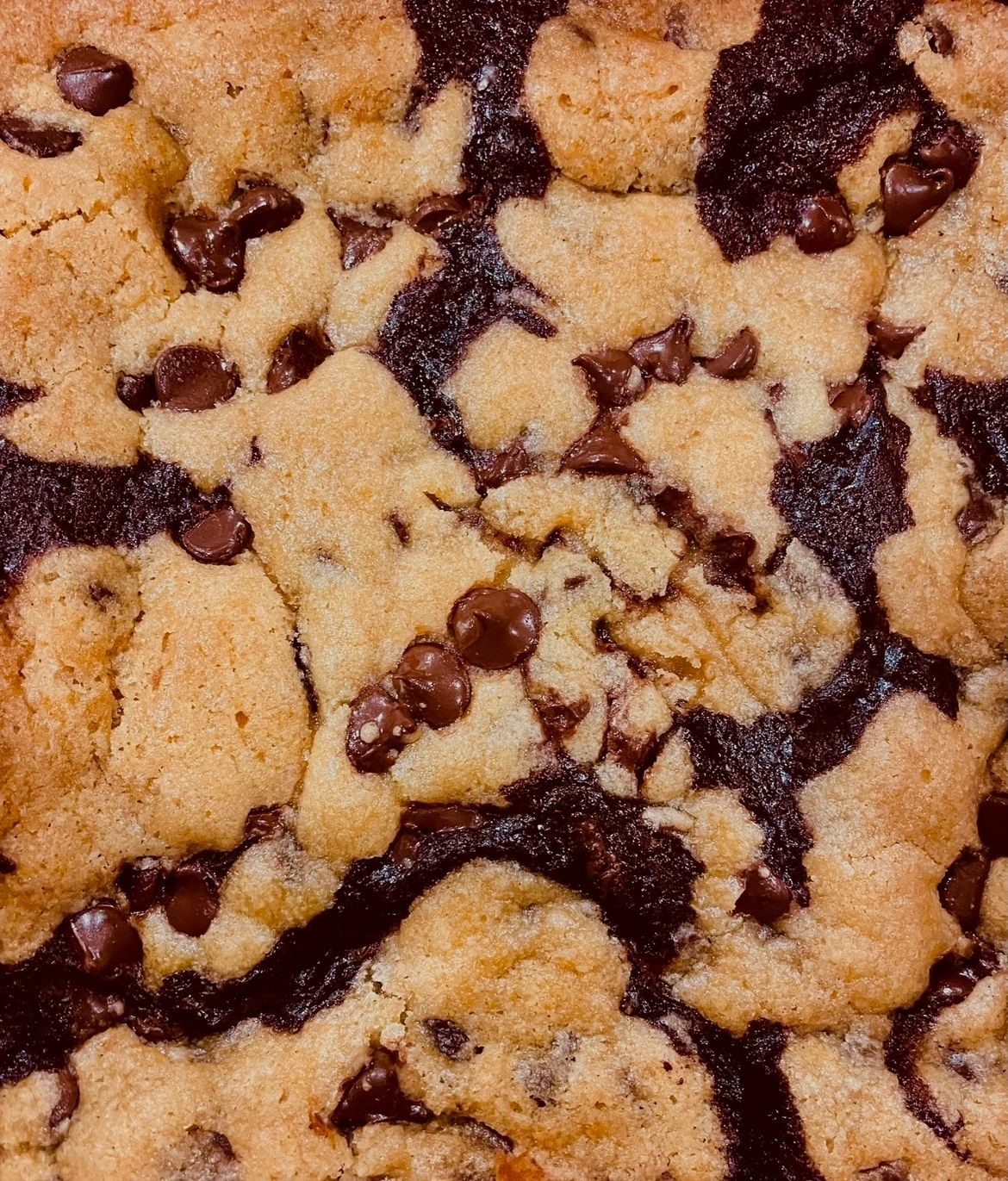 Close-up of a brookie: cookie dough swirled through brownie