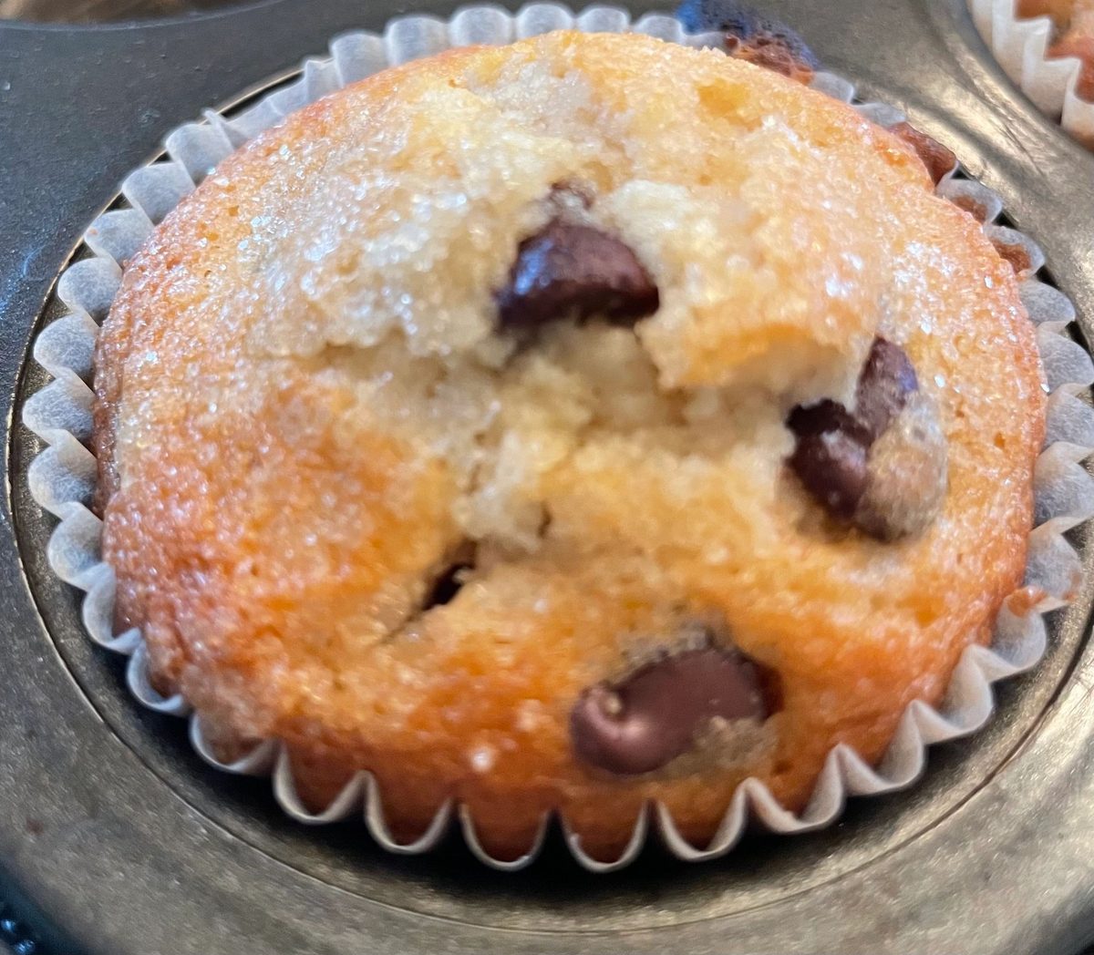 Close-up of a sugar-topped chocolate chip muffin