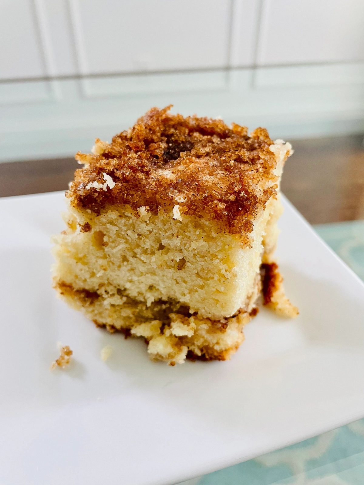 A slice of cinnamon streusel coffee cake