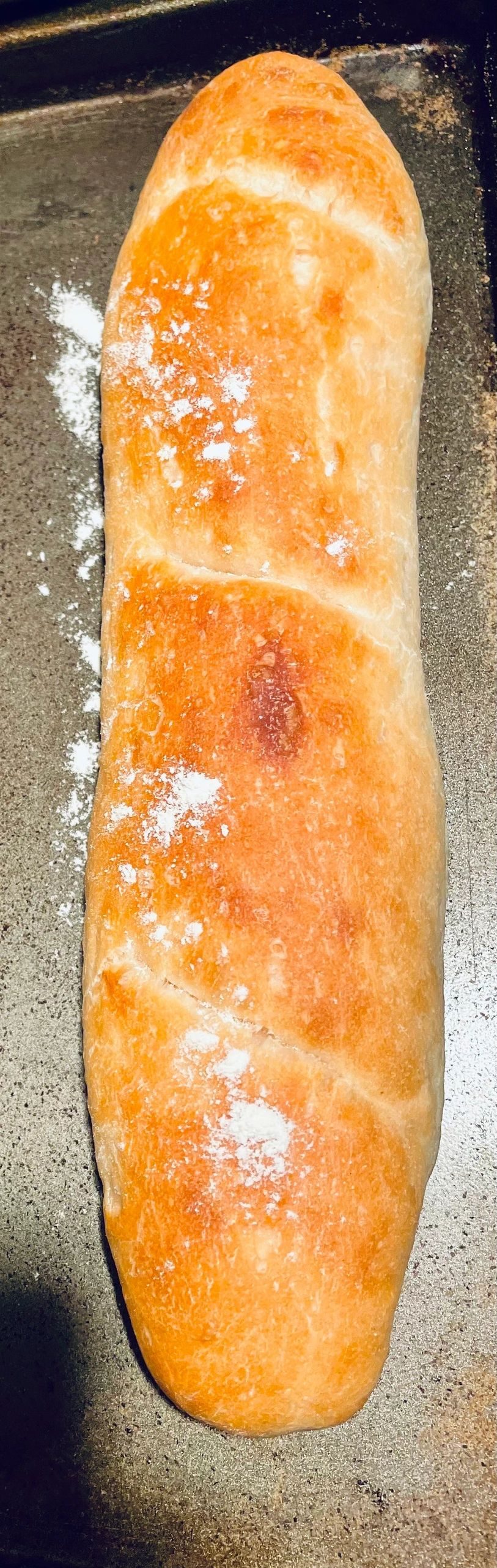 A long golden loaf of bread